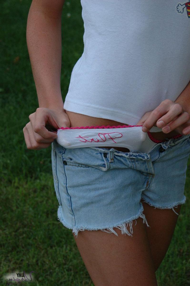 20P Pictures of Amy Virgin showing you her amateur tits and panties
