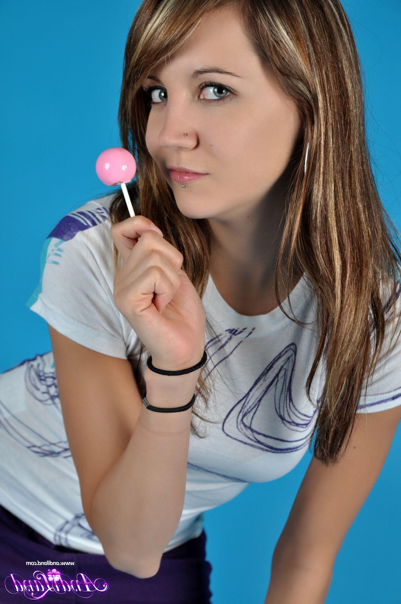 15P Pictures of Andi Land sucking on a lollipop