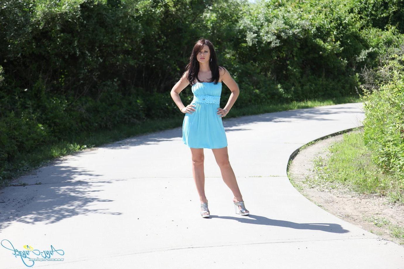 15P Ann Angel teases in a sexy blue dress outside