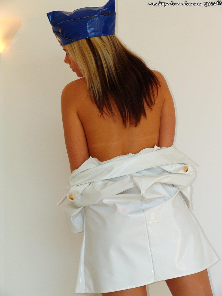 14P Pictures of Ann Angel dressed as one sexy flight attendant