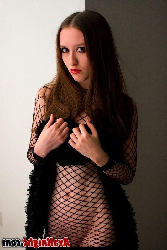 14P Pictures of teen Ava Knight posing in a fishnet dress