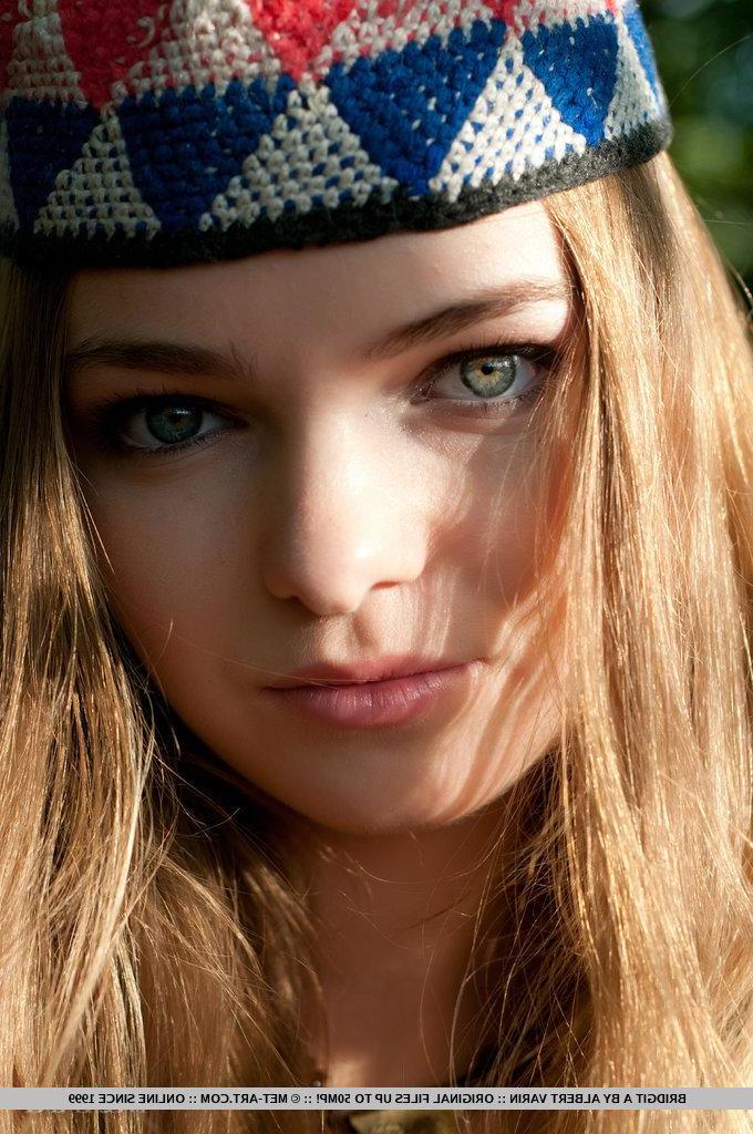 18P Pictures of redhead teen Bridgit A naked and spreading in the woods