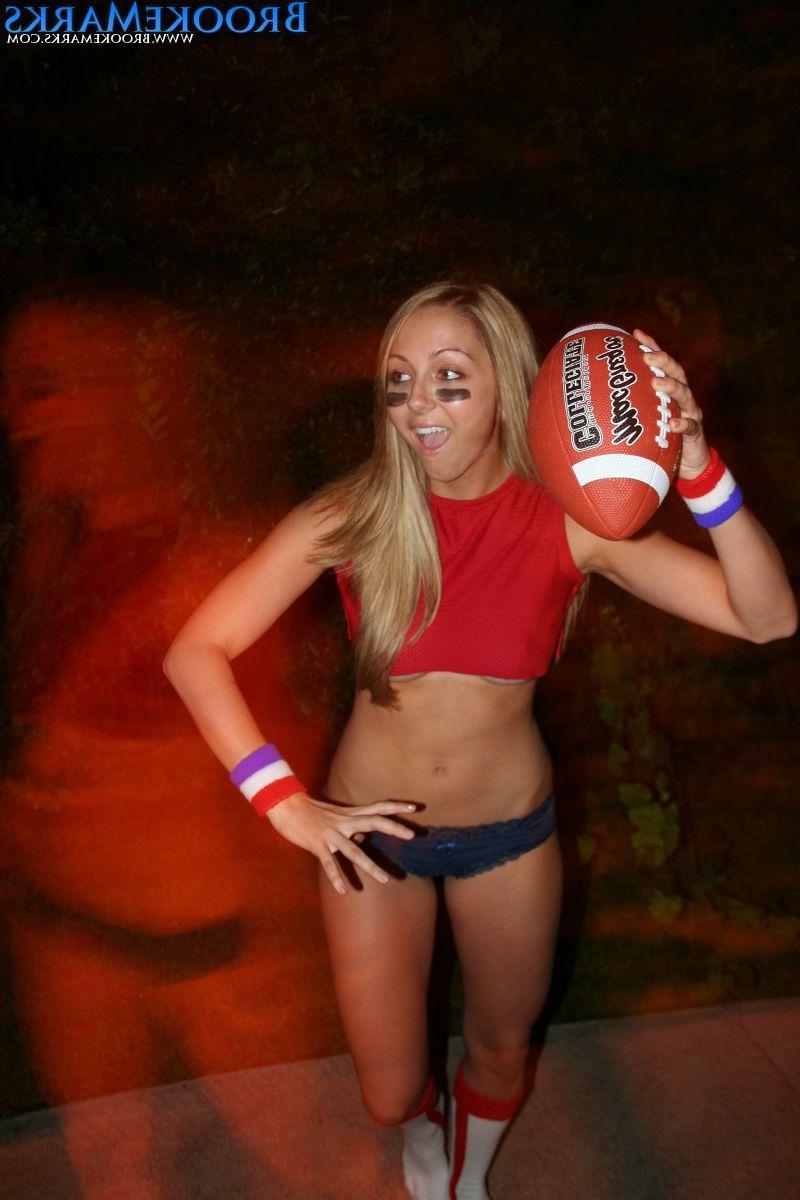 12P Pictures of Brooke Marks being hot with a football