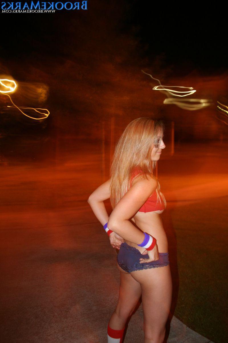 12P Pictures of Brooke Marks being hot with a football