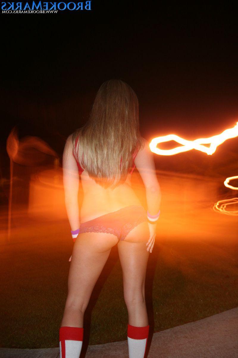 12P Pictures of Brooke Marks being hot with a football