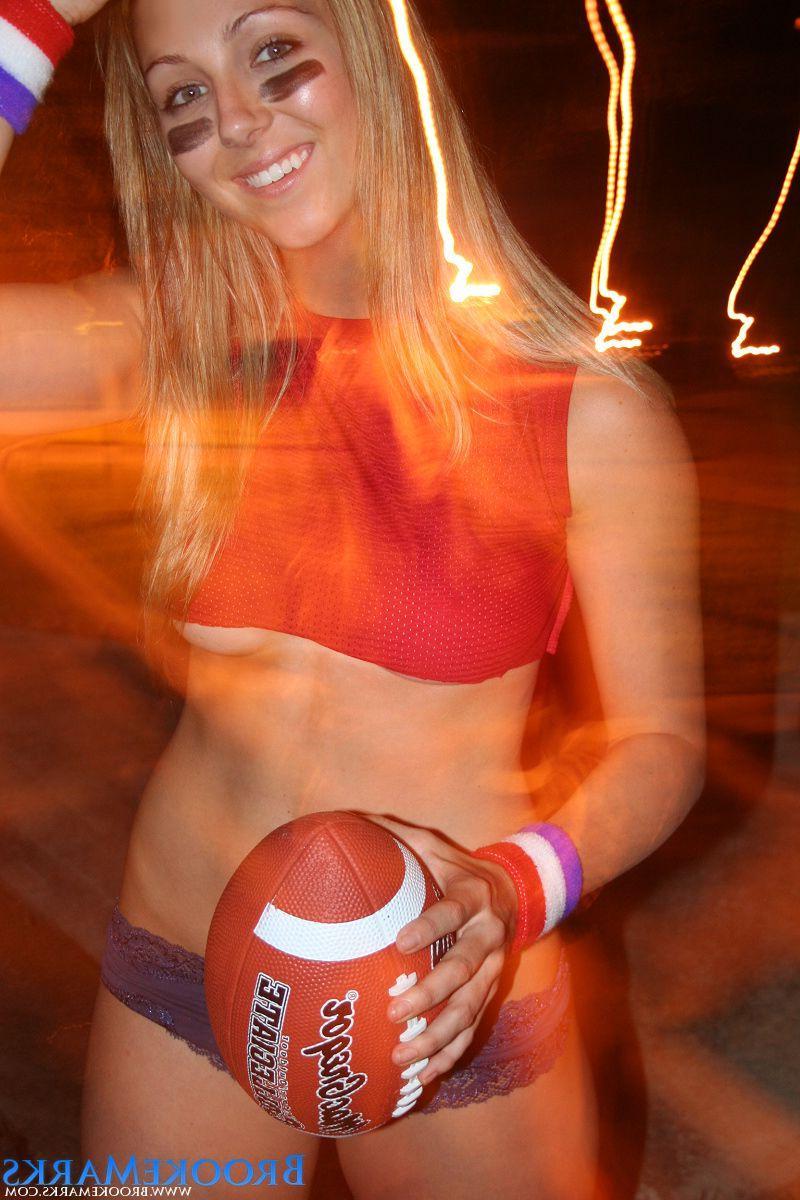 12P Pictures of Brooke Marks being hot with a football