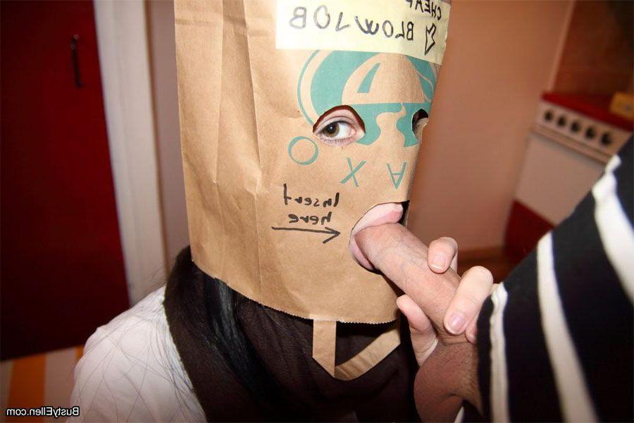 15P Pictures of teen nympho Busty Ellen sucking cock through a paper bag