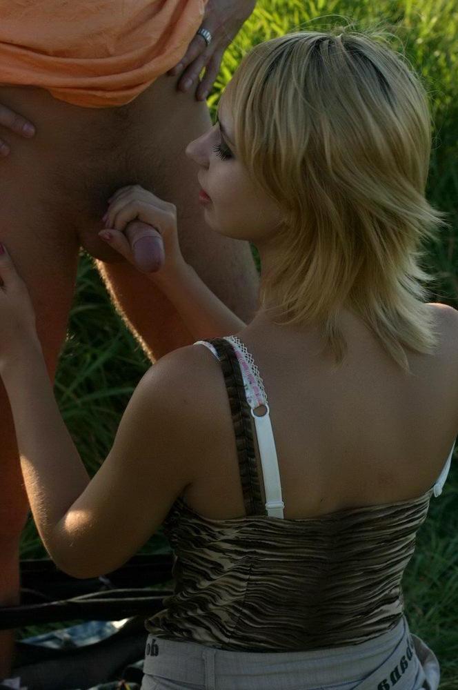 15P Pictures of teen star Busty Nastya working a cock outside