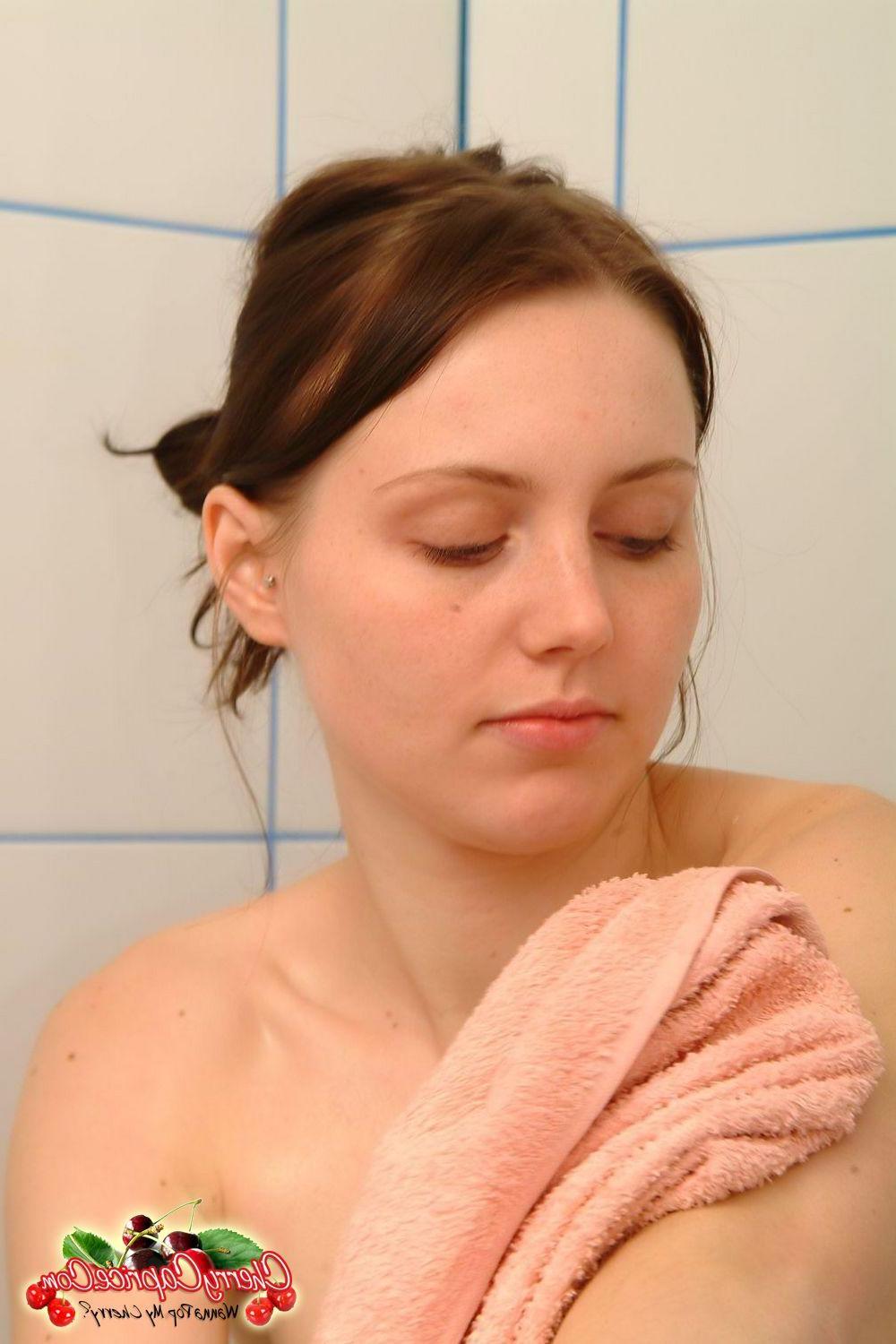 20P Pictures of Cherry Caprice making her teen body all wet