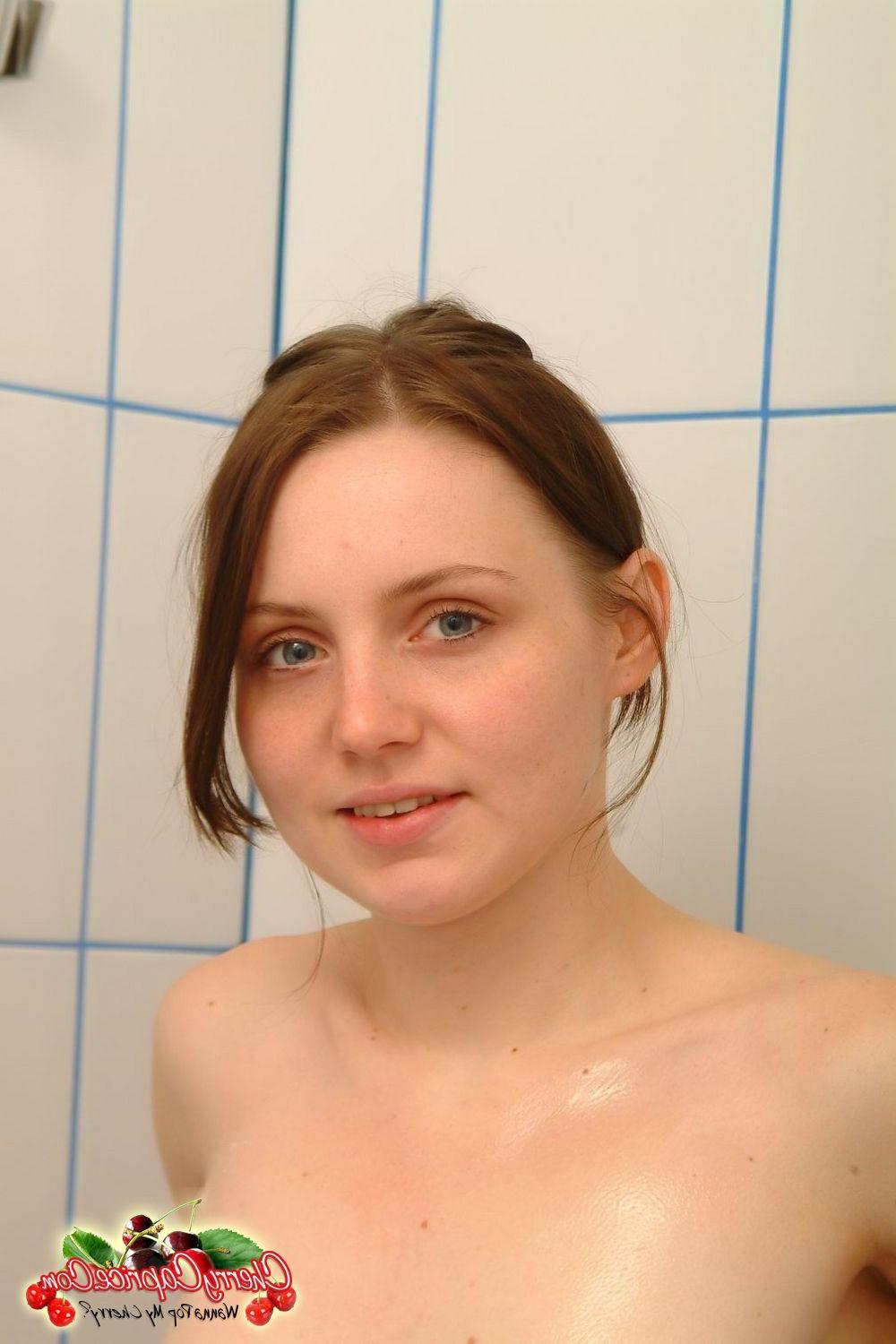 20P Pictures of Cherry Caprice making her teen body all wet