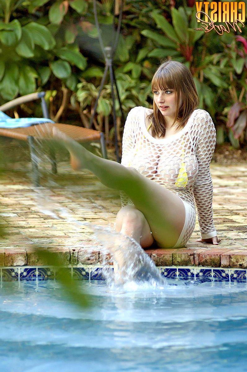 15P Pictures of Christy Marks cooling off her hot body in the pool