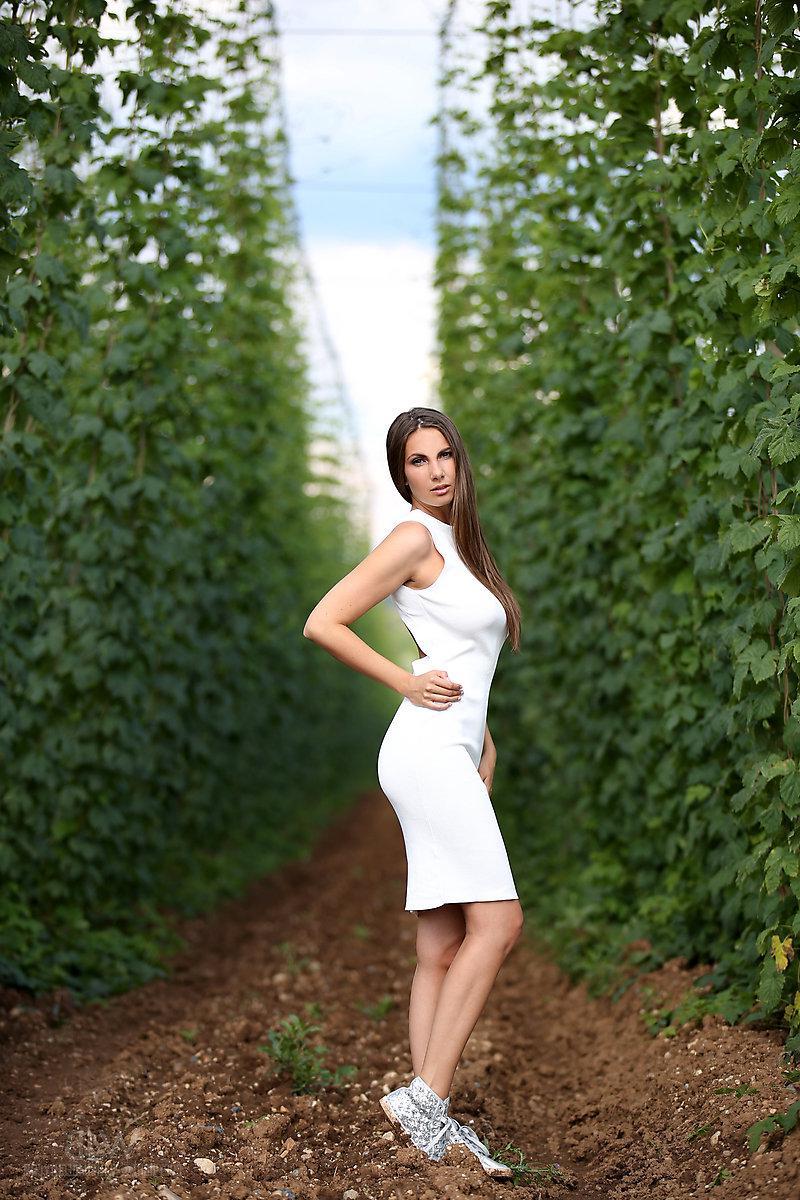16P Beautiful Czech girl Connie Carter strips nude on a farm