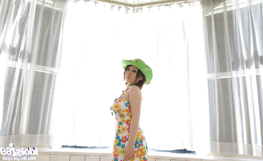 14P Voluptuous asian babe Hanano Nono slipping off her dress and panties