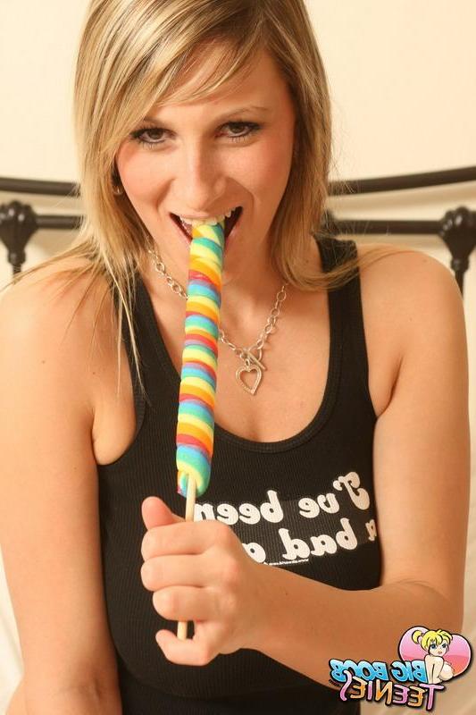 16P Pictures of busty schoolgirl Demi sucking her lollipop in bed