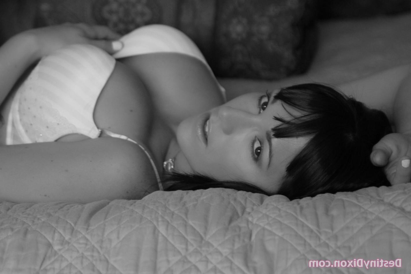15P Destiny Dixon gets naked in bed and masturbates in black and white