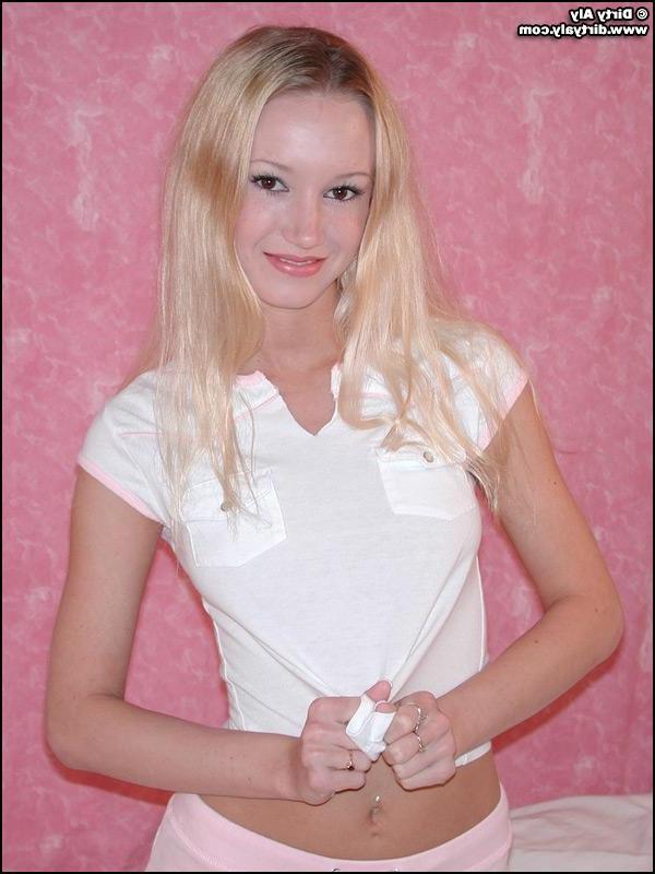 20P Pics of teen star Dirty Aly showing her tits in bed