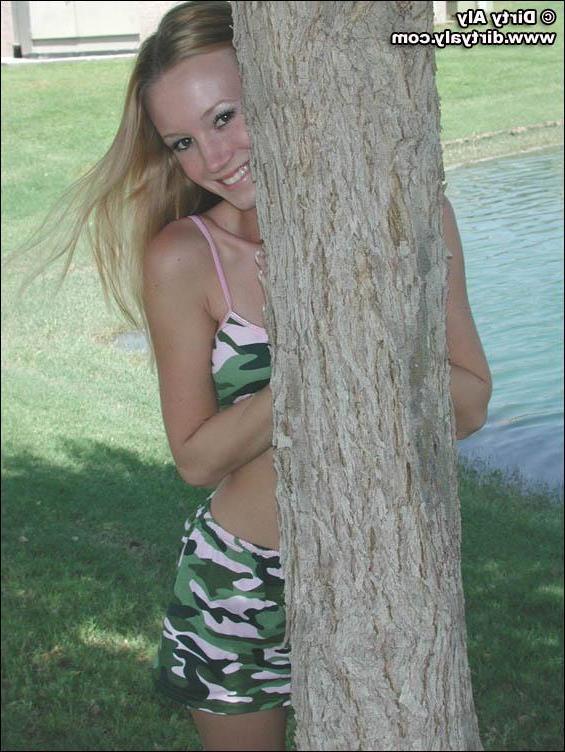 20P Pictures of teen Dirty Aly barely dressed in camo
