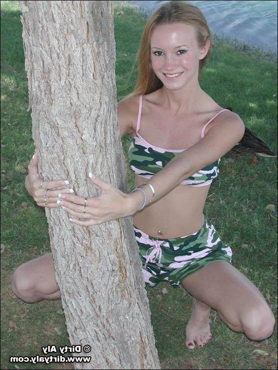 20P Pictures of teen Dirty Aly barely dressed in camo