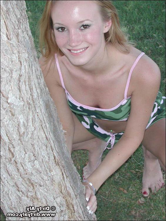 20P Pictures of teen Dirty Aly barely dressed in camo