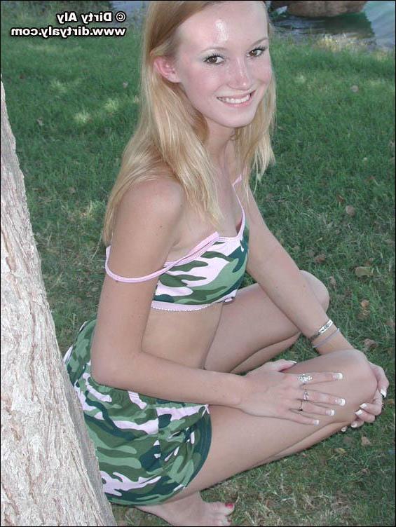 20P Pictures of teen Dirty Aly barely dressed in camo