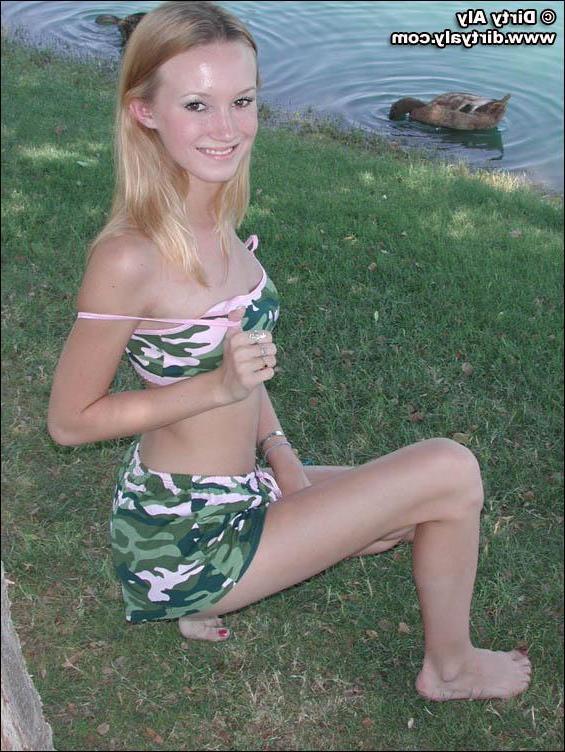 20P Pictures of teen Dirty Aly barely dressed in camo
