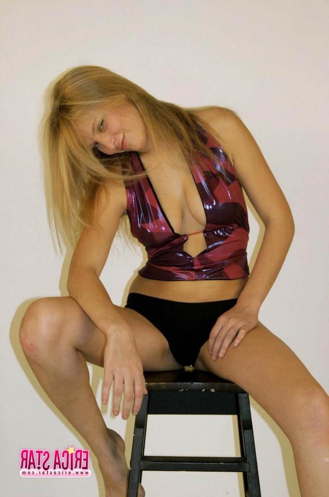 15P Pictures of Erica Star teasing in a dress