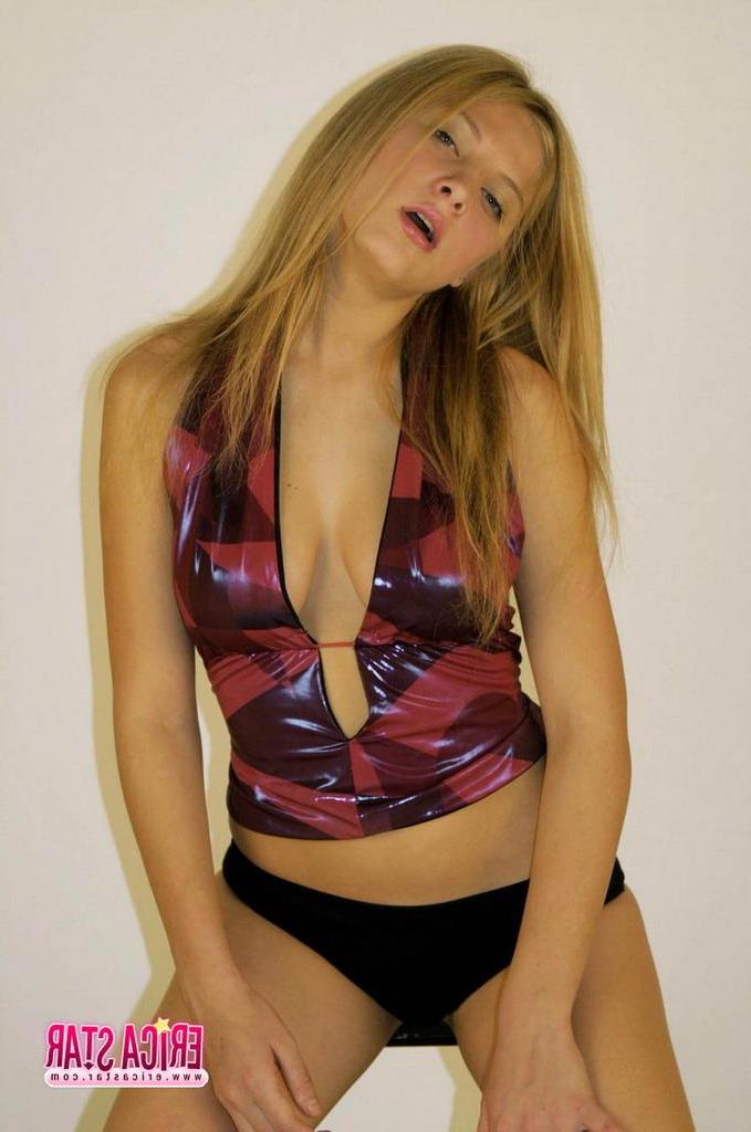 15P Pictures of Erica Star teasing in a dress