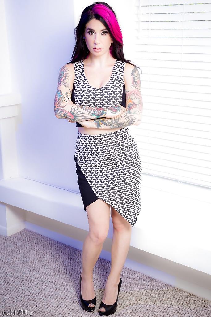 16P Fetish model Joanna Angel modelling non nude in skirt and high heels