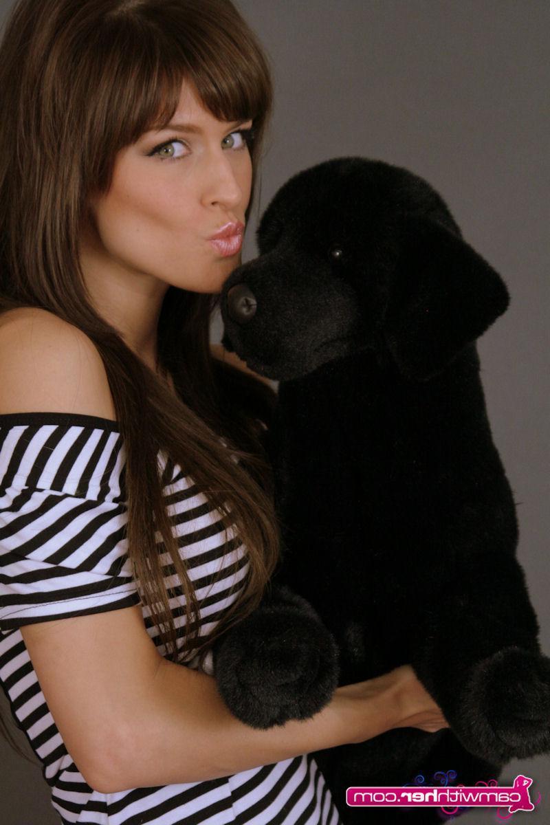 12P Femme teases in a sexy tight dress with a stuffed puppy dog