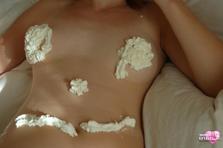 16P Stunning redhead teen Laura gets naughty with berries and cream all over her body