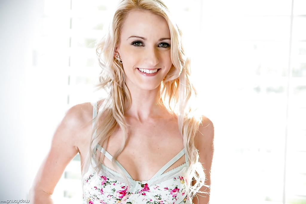 16P Teen blonde Skylar Green shows her small boobies in the white bedroom