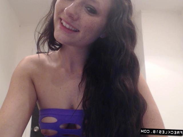 12P Hot girl Freckles 18 gives a webcam tease in her purple mesh dress