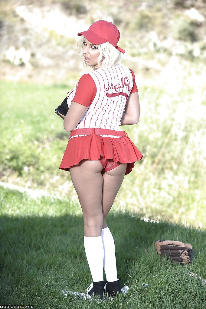 16P Sporty babe with big boobs Lylith Lavey stripping off her outfit outdoor
