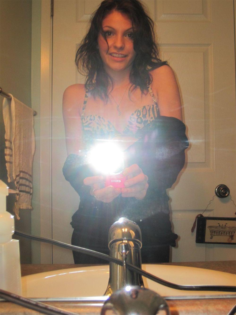 15P Pictures of Fuckable Lola taking sexy pics of herself