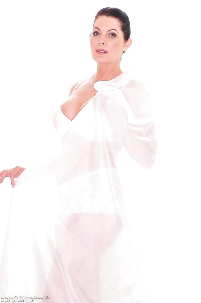 16P Curvaceous mature brunette Magdalene St. Michaels stripping off her lingerie