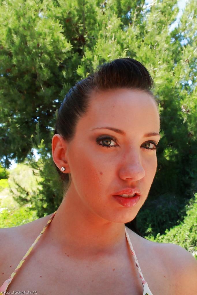 16P Naughty chick Kelly Divine uncovering her big jugs and fatty butt outdoor