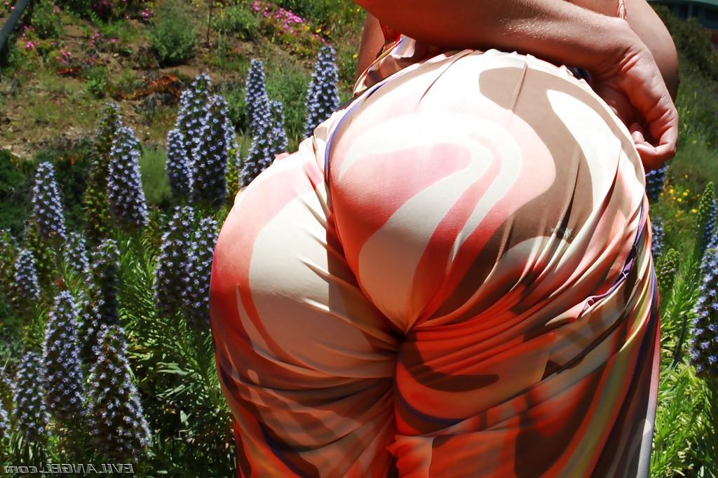 16P Naughty chick Kelly Divine uncovering her big jugs and fatty butt outdoor