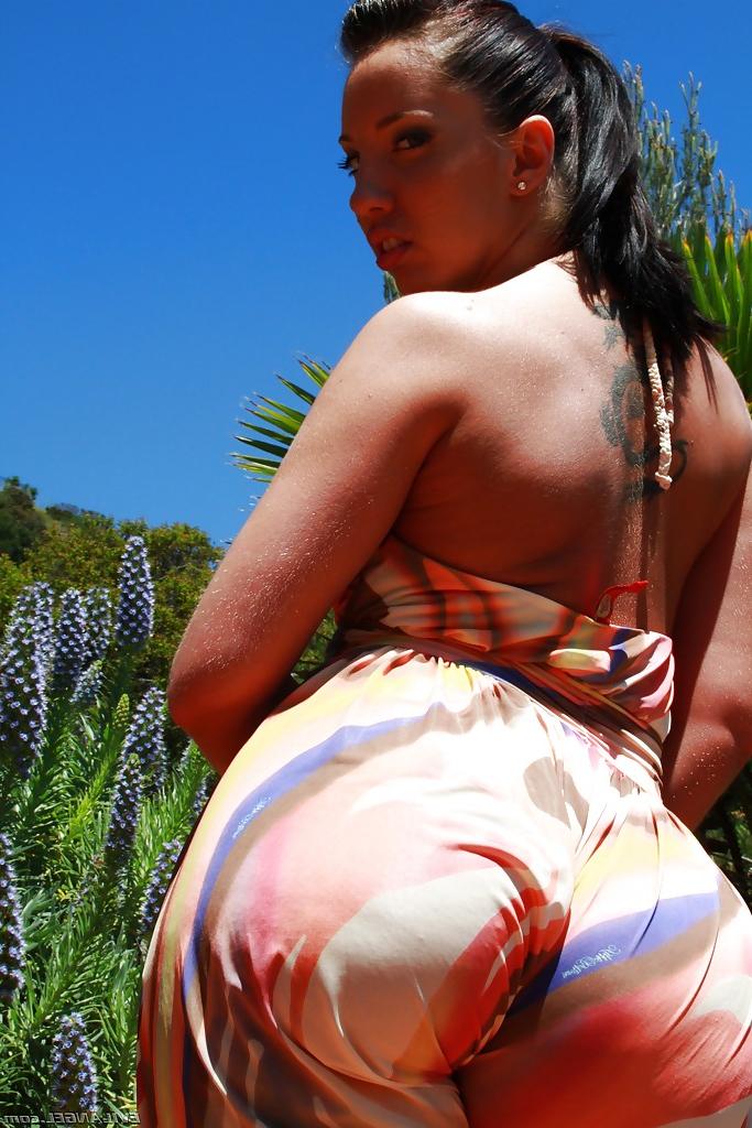 16P Naughty chick Kelly Divine uncovering her big jugs and fatty butt outdoor