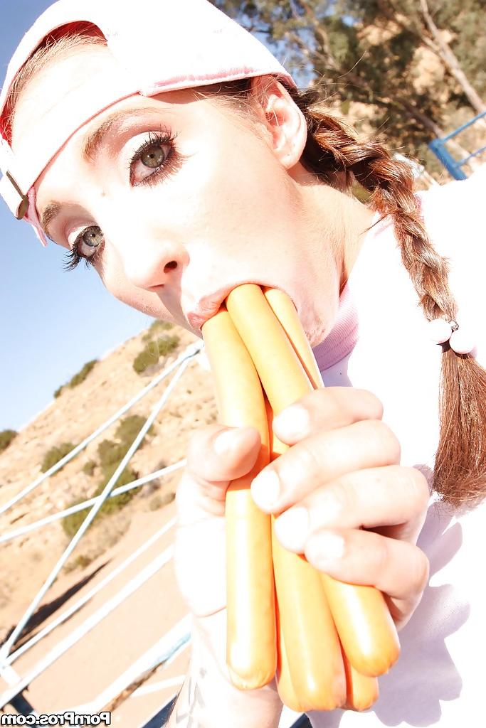 16P Sports babe with pigtails Kelly Divine shows her boobs outdoor