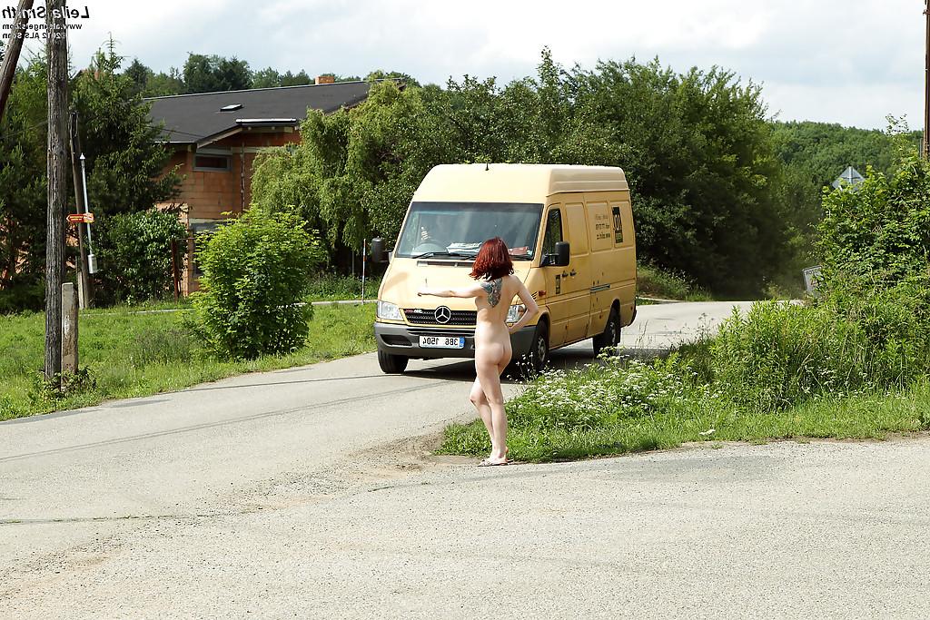 16P Pretty redhead babe with neat ass and perky tits posing naked outdoor