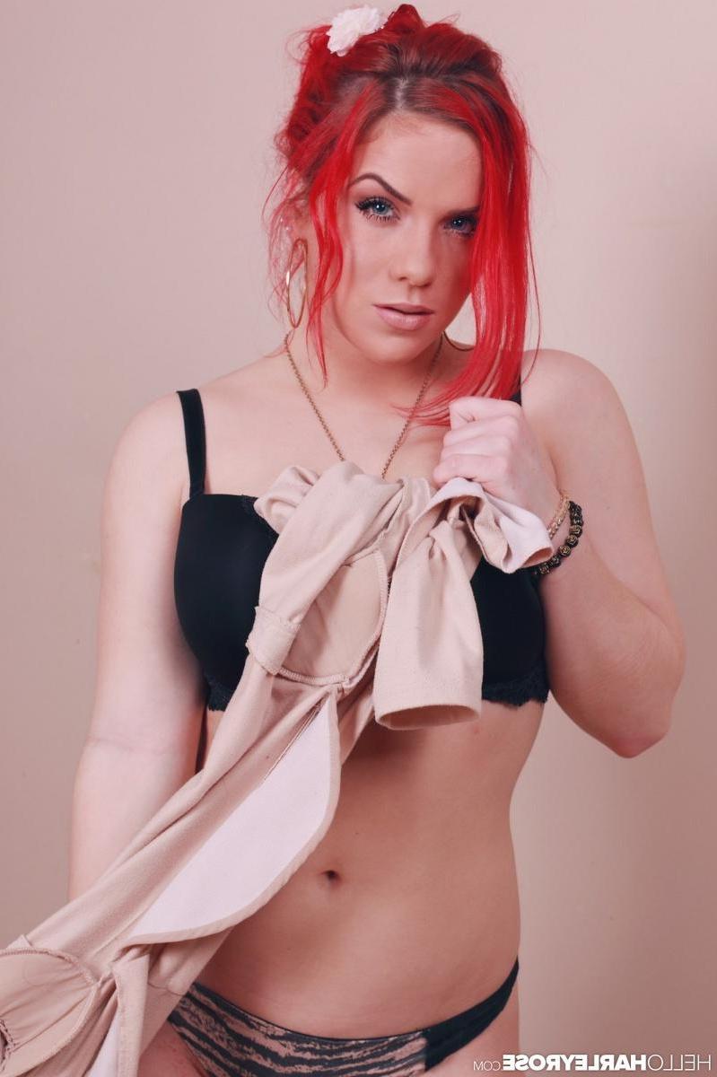 15P Redhead hottie Harley Rose gives you a slow and sexy striptease in her high heels