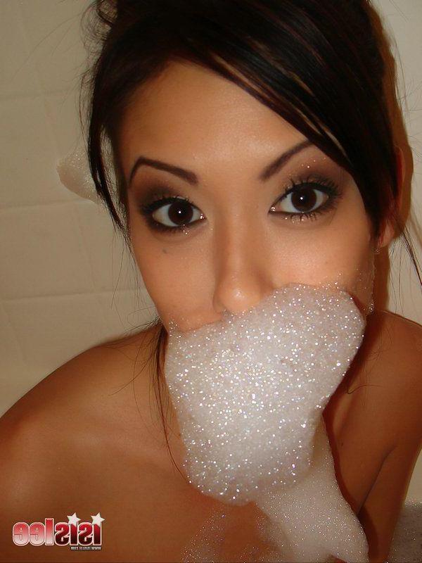 14P Pictures of teen babe Isis Lee soaping up her hot body