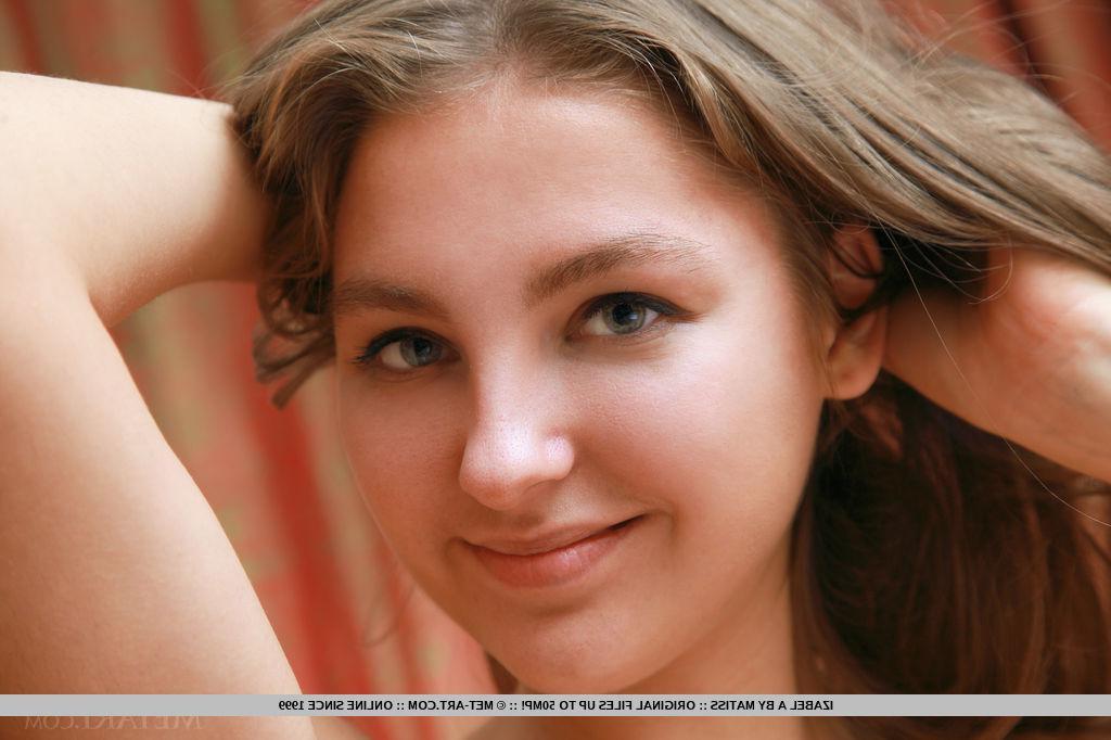 18P Izabel A poses on the elegant sofa to show off her face and delicious body