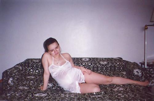 20P Little pregnant brunette on her bed