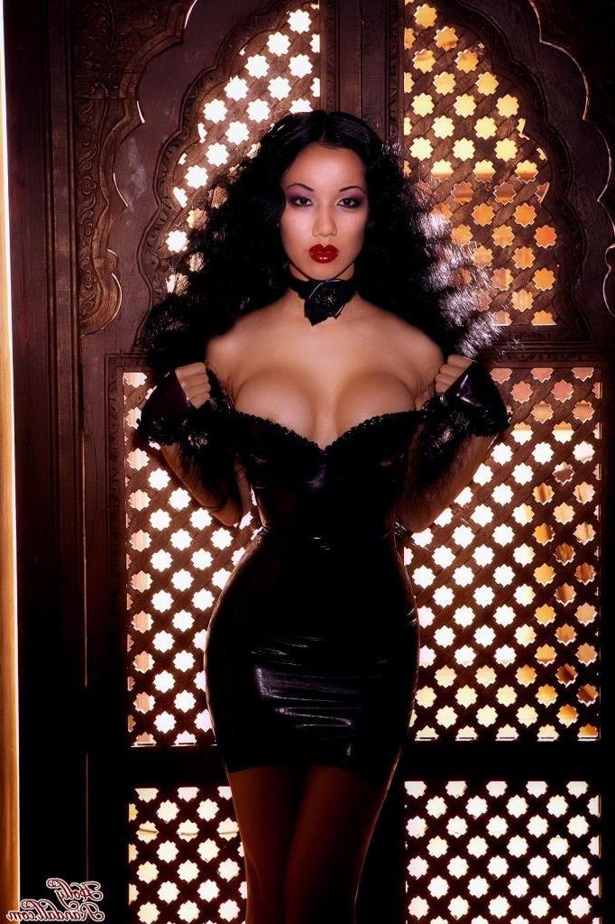 15P Pictures of Jade Vixen stripping out of her custom-made purple latex dress