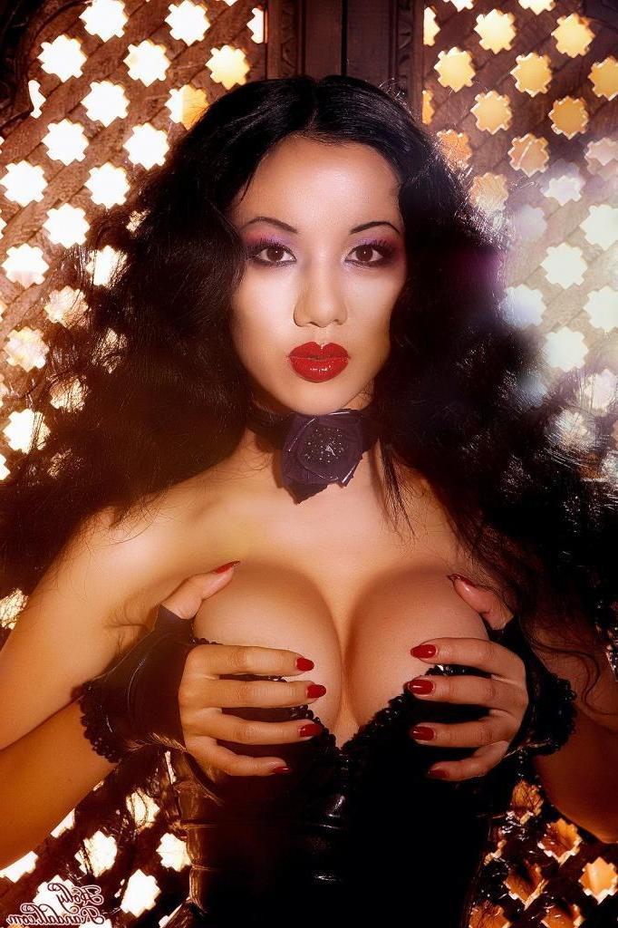 15P Pictures of Jade Vixen stripping out of her custom-made purple latex dress
