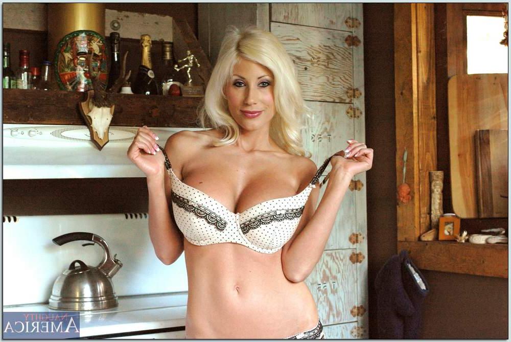 16P Busty MILF Puma Swede brings out her stunning assets from underwear