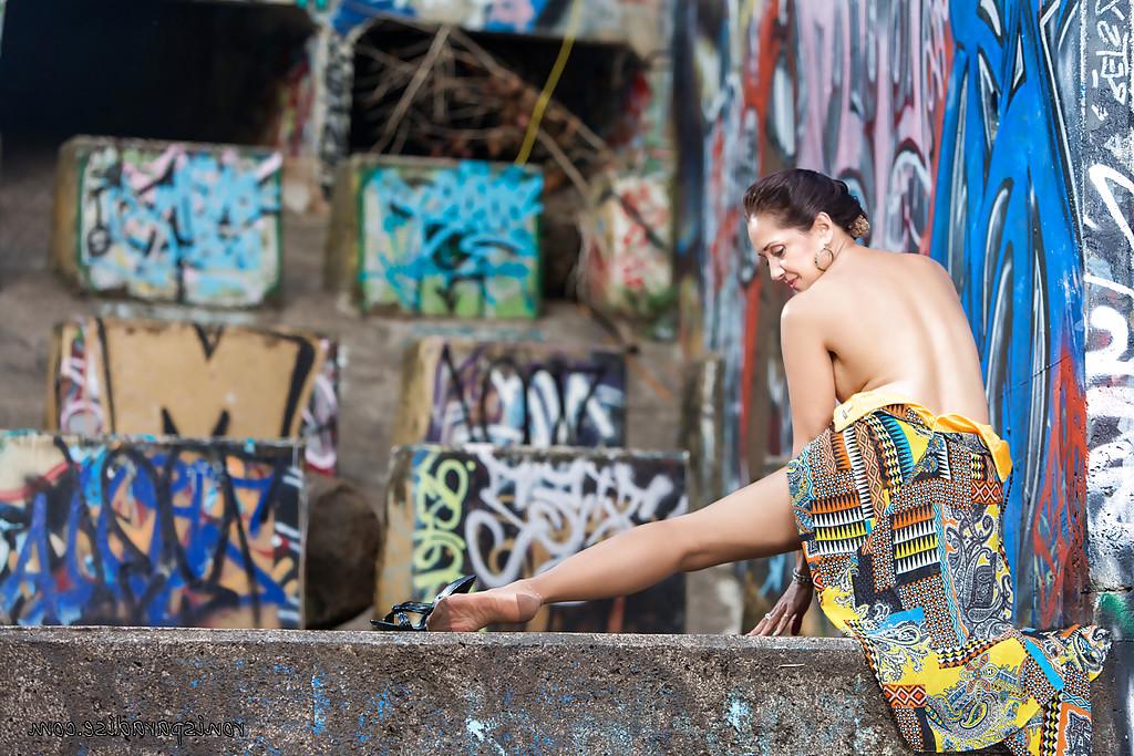 16P Roni has style and she knows how to pose naked against the wall