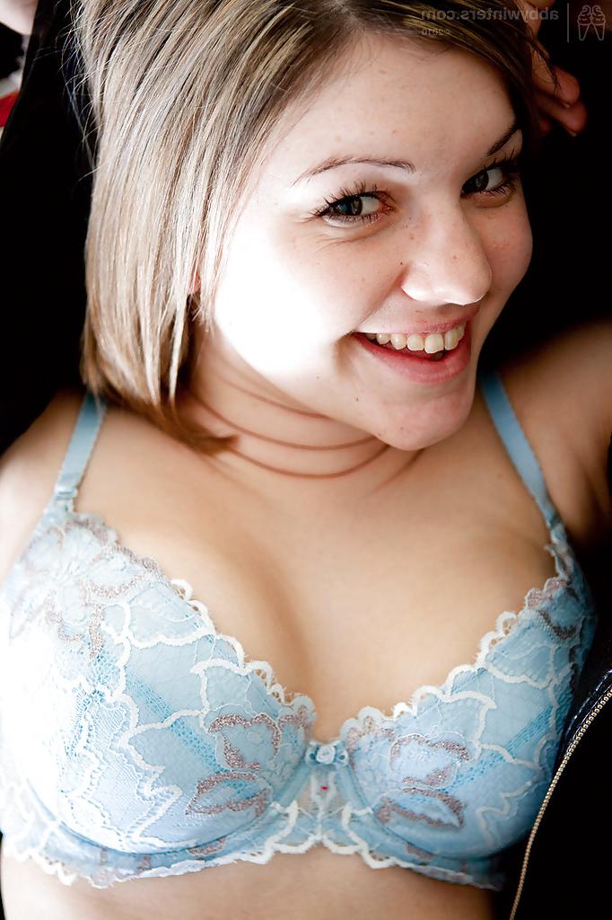 16P Busty blonde amateur Roxy posing in black leather jacket and bra