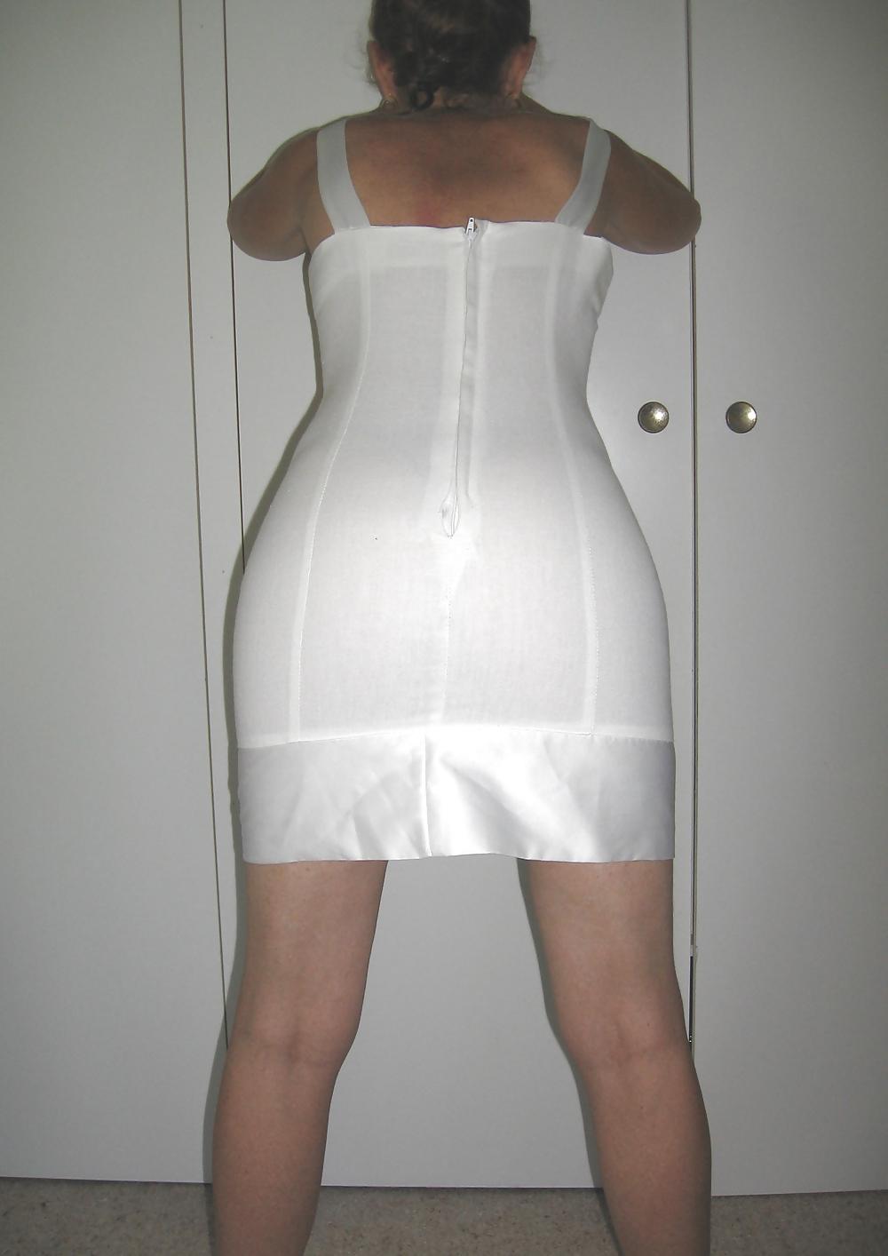 25P Upskirts of my redhead wife in her tight white dress